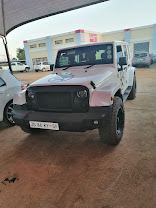 A vehicle in for service at JustFix